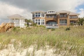 Coastal shingle style home on Atlantic Ocean in North Carolina.